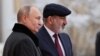Russia - Russian President Vladimir Putin greets Armenian Prime Minister Nikol Pashinian during a CIS sumit in St. Petersburg, December 26, 2023.