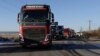 TIR-uri pleacă dintr-o parcare din Bolintin Vale în drum spre Centura Capitalei, pe 11 ianuarie 2024 (Imagine de arhivă).