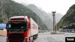 RUSSIA -- An Armenian tuck passes through the Russian-Georgian border crossing at Upper Lars, June 21, 2023.