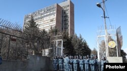 Armenia - Riot police guard the former Defense Ministry building cleared of squatters, February 16, 2023.