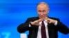 Президент России Владимир Путин во время ежегодной пресс-конференции. Москва, 14 декабря 2023 года