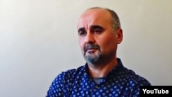 Armenia - Turkish American activist Kemal Oksuz is questioned by Armenian police, 29 August 2018.