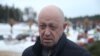 Основатель "ЧВК Вагнера" Евгений Пригожин на похоронах наемника, 24 декабря 2022 года
