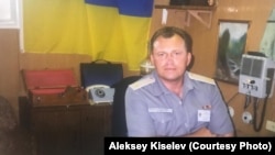 Ukrayina Arbiy deñiz quvetleriniñ "Slavutiç" istihbarat gemisiniñ sabıq komandanı Oleksiy Kısılev