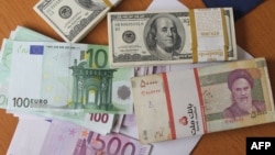 Եվրոյի, դոլարի և իրանական ռիալի թղթադրամներ, արխիվ