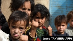 په کندهار کې واکسين شوي ماشومان (د ۲۰۲۲ کال د جون د میاشتې انځور) 