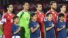 Armenia - Henrikh Mkhitaryan (L) and other Armenia players sing the national anthem before a Euro 2016 qualifying match against Albania, Yerevan, 11Oct2015.