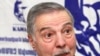 Armenia -- Former Olympic champion Albert Azarian holds a news conference on December 11, 2009.