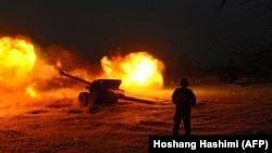 An Afghan Army soldier fires an artillery shell during an ongoing anti-Taliban operation in Farah Province earlier this year. (file photo)