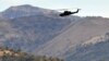 Turkey -- A Turkish military helicopter flies over a mountain in Yemisli, Hakkari province near the Iraqi border, 22Oct2011