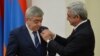 Armenia -- President Serzh Sarkisian awards a medal to his brother Levon, March 22, 2016.