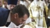Russia -- President Dmitry Medvedev pays his last respects to Patriarch Aleksy II inside Christ the Savior cathedral in Moscow, 09Dec2008