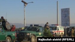 Afghan security force arrive near the site after a suicide bomber blew himself up inside a packed mosque on a base in Khost on November 23.