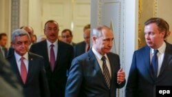 Russia -- Russian President Vladimir Putin (front C), Armenian President Serzh Sargsyan (L), Azerbaijan's President Ilham Aliyev (2-L) walk during their meeting in St. Petersburg, Russia, 20 June 2016.