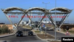 Iraq -- Vehicles drive out of the Erbil International Airport, November 23, 2015