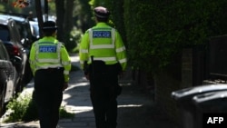 Police officers patrol outside the home of British Prime Minister Keir Starmer in London on May 13. 