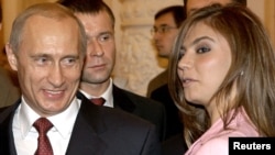 Владимир Путин бо Алина Кабаева. Акс аз соли 2024