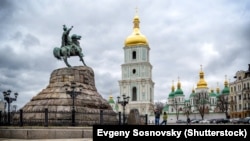 UKRAINE -- View on Hetman Bohdan Khmelnytsky monument and Saint Sophia Cathedral on Sofia square in Kyiv, 14Mar2016