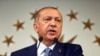 Turkey's President Recep Tayyip Erdogan delivers a statement on national television from his official residence in Istanbul on June 24.