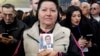Serbia -- Supporters listen to the speech of Serbian Prime Minister Aleksandar Vucic (not pictured), and the Serbian Progressive Party candidate for the Serbian presidency, during a campaign rally in Vranje, March 2, 2017