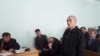 Умар Мирзоев (сидит слева) в ходе судебного процесса все время скрывал свое лицо