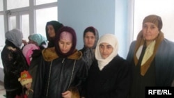 Як гурӯҳи зарардигони таркиш