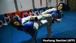 Afghan women take part in a tae kwon do training session at a gym in Herat province. (file photo)