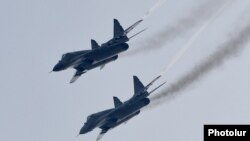 Armenia - Russian MiG-29 fighter jets fly over the Erebuni airbase in Yerevan, 12Feb2016.