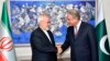 Iranian Foreign Minister Javad Zarif (left) with Pakistani Foreign Minister Shah Mahmood Qureshi in Islamabad.