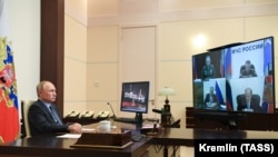 RUSSIA -- Russian President Vladimir Putin attends a meeting dedicated to a humanitarian mission in the region of Nagorno-Karabakh via a video conference call at the Novo-Ogaryovo state residence outside Moscow, November 13, 2020