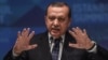 Turkey -- Turkish President Recep Tayyip Erdogan speaks during a press conference after the closing session of the 13th summit of the Organization of Islamic Cooperation (OIC) at Istanbul's Congress Center (ICC), April 15, 2016