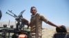 Avganistanski vojnik na kontrolnom punktu pošto su bezbednosne snage očistile oblast od talibanskih ekstremista u avganistanskoj provinciji Laghman, 8. jul 2021.
