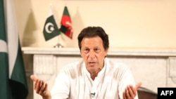 PAKISTAN - Pakistan's cricketer-turned politician Imran Khan, and head of the Pakistan Tehreek-e-Insaf (Movement for Justice) party, addresses the nation at his residence in Islamabad a day after general election, Islamabad, July 26, 2018