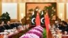 وزیراعظم عمران خان په بیجنګ کې له چینايي ولسمشر شي جېنپېنګ سره د غونډې پر مهال - د ۲۰۱۹ز کال انځور