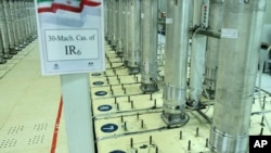 A photo released in 2019 by the Atomic Energy Organization of Iran shows centrifuge machines in the Natanz uranium enrichment facility.
