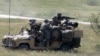 Militari britanici din Brigada 16 de asalt aerian participă la exercițiul militar „Swift Response 22” în Macedonia de Nord, mai 2022 (Imagine de arhivă).