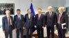 Еврокомесарот Јоханес Хан со лидерите на партиите потписнички на Пржинскиот договор. 