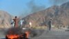 Men shout slogans against terrorists after a suicide attack among the protesters in Momandara district of Nangarhar Province on September 11.