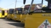 Armenia -- Commuter buses belonging to the King Delux company, Abovian, 11Jul2012.