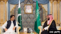 Pakistani Prime Minister Imran Khan (left) on a previous visit to Saudi Arabia.