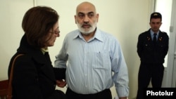 Armenia - Activist Vardges Gaspari and his wife pictured in a court house in Yerevan, 26Feb2016.