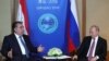 Раҳмон ба Путин гуфтааст, шароити муҳоҷиронро беҳтар кунад