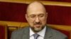 UKRAINE -- Denys Shmyhal, who was nominated as the candidate for the post of Ukrainian Prime Minister, applauds during a parliamentary session in Kyiv, March 4, 2020