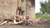 Наслідки нічного артилерійського обстрілу селища Первомайське (відео)